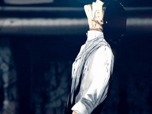 a man in a white shirt and tie is looking up at the sky