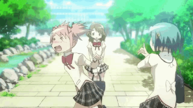 a group of anime girls are walking down a path