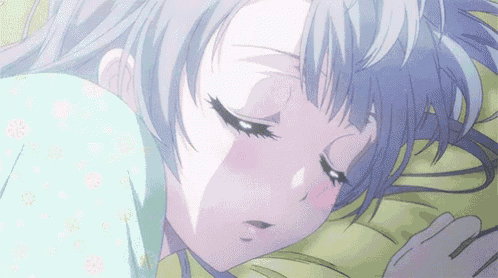 a girl with blue hair is sleeping on a bed