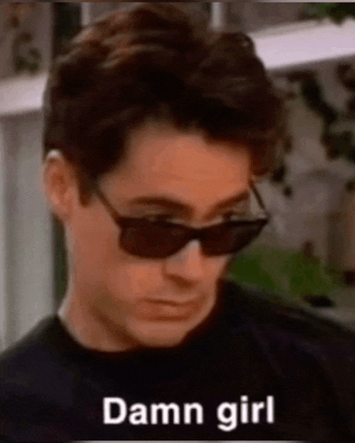 a man wearing sunglasses is talking about a girl .
