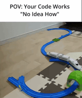 a picture of a toy train track with the caption " your code works no idea how "