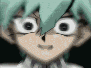 a close up of a person 's face with a very scary expression on their face .