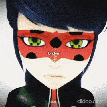 a close up of a ladybug 's face with london written on her face