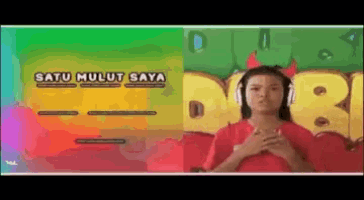 a woman wearing headphones with the words satu mulut saya on the bottom