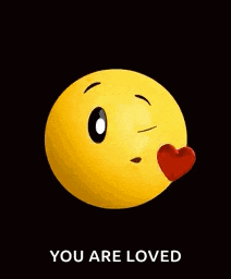 a yellow smiley face with a red heart and the words `` you are loved '' below it .