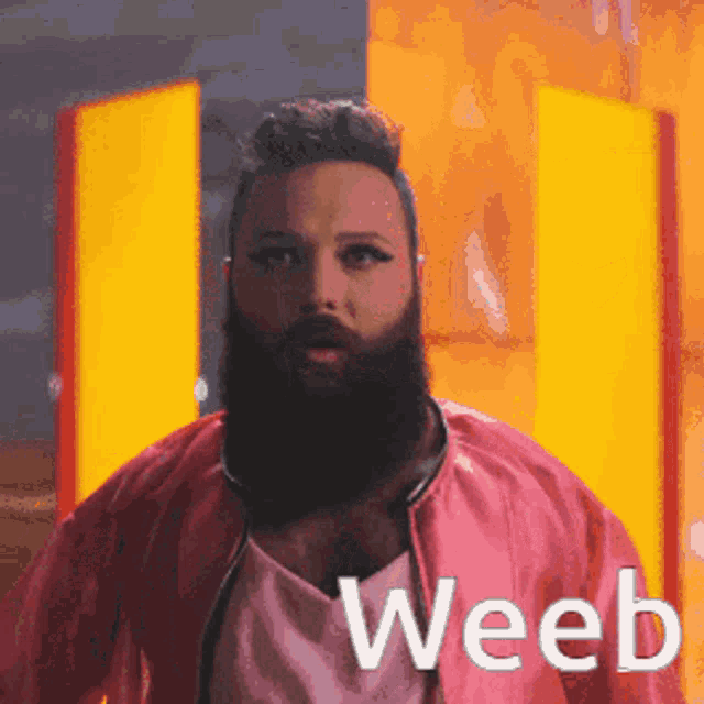 a man with a beard is wearing a pink jacket with the word weeb written on it