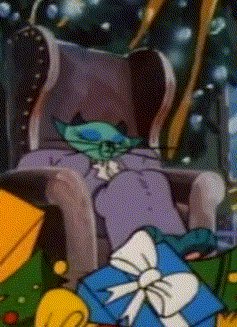 a cartoon character is sitting in a chair next to a blue gift box with a bow .