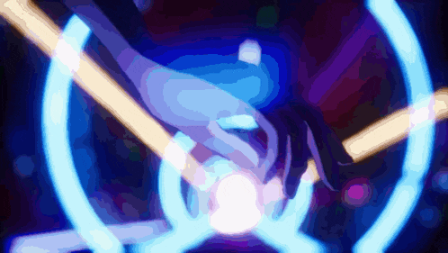 a blurry picture of a person holding a light in their hands