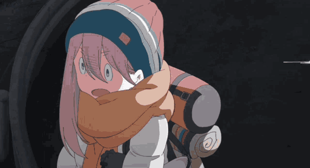 a girl with pink hair and a scarf around her neck looks surprised
