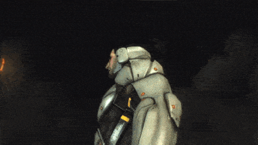 a man in a futuristic suit has a fireball coming out of his forehead