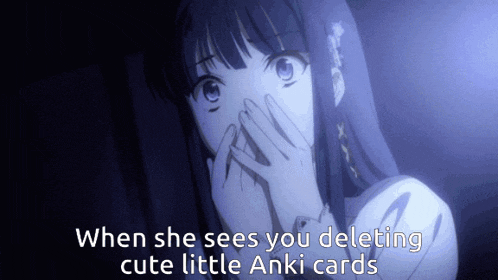 a girl is covering her mouth with her hands and the words " when she sees you deleting cute little anki cards " are below her