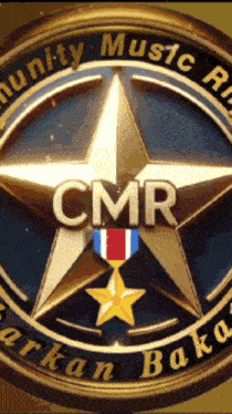 a medal with a star and the words cmr on it