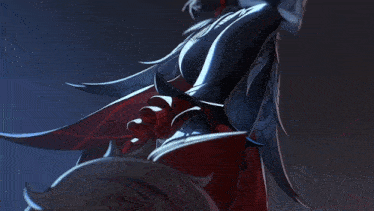 a close up of a person 's legs with a red ribbon
