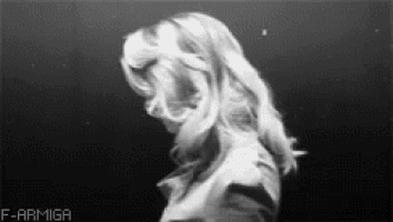 a black and white photo of a woman 's face with the words f-armiga written below her