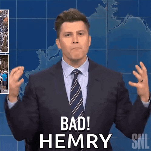 a man in a suit and tie says bad henry