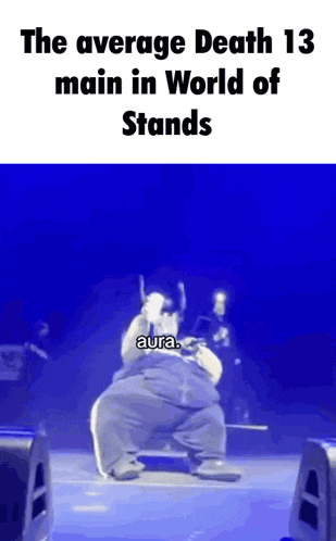 a fat man is standing on a stage in front of a microphone .