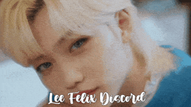a close up of a person with the name lee felix discord on the bottom