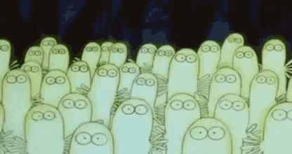 a group of glow in the dark cartoon characters are standing next to each other .