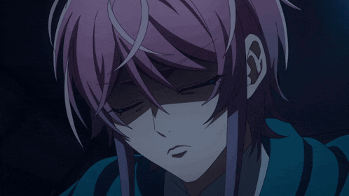a close up of a person with pink hair
