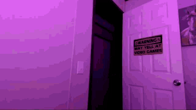 a door with a warning sign that may yell at video games