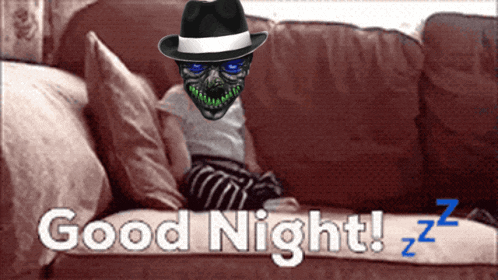 a man in a hat is laying on a couch with the words good night