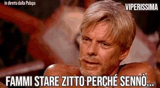 a man with a beard is making a funny face with the words fammi stare zitto perche senno written below him .