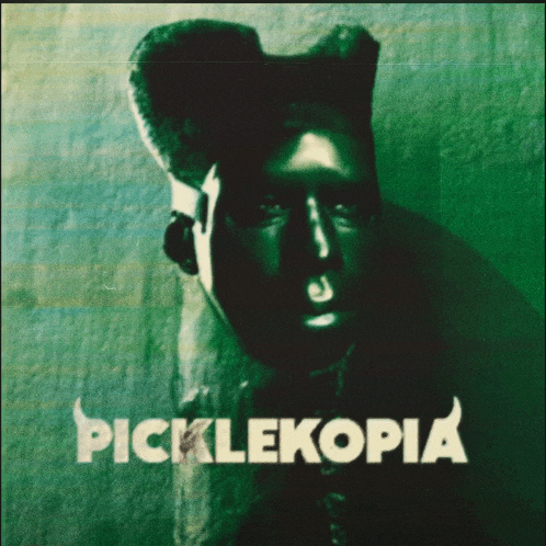 a poster for picklekopia shows a man with horns