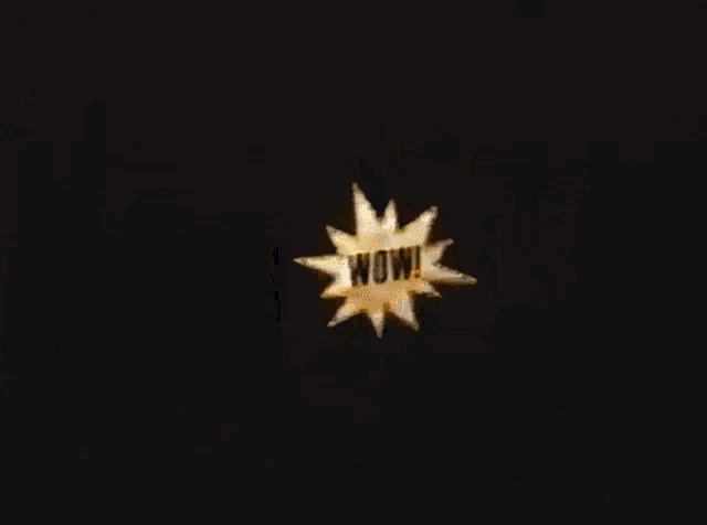 a star with the word wow written on it