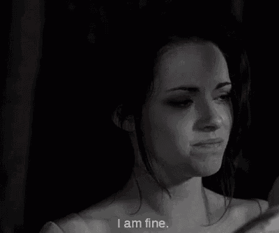 a black and white photo of a woman with the words `` i am fine '' written above her .