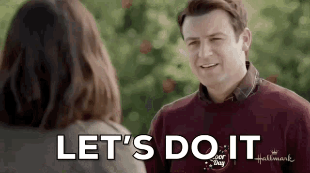 a man and a woman are talking to each other and the man is saying let 's do it .