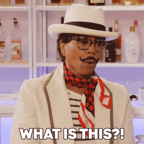 a man wearing a hat and scarf is asking what is this