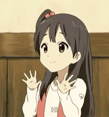 a girl in a white shirt is waving her hand and smiling .