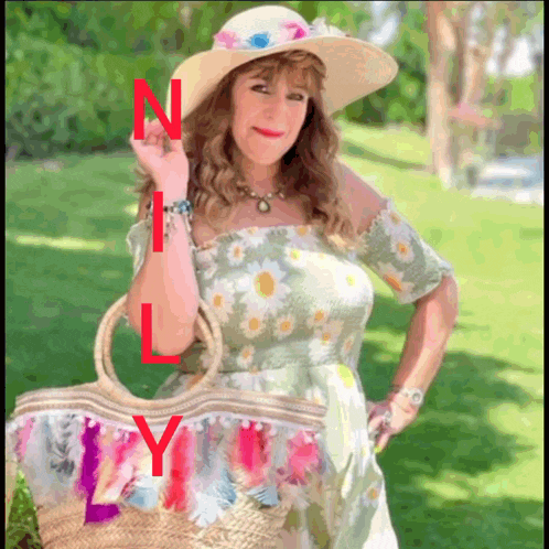 a woman wearing a hat and holding a straw bag with the letter n and l visible