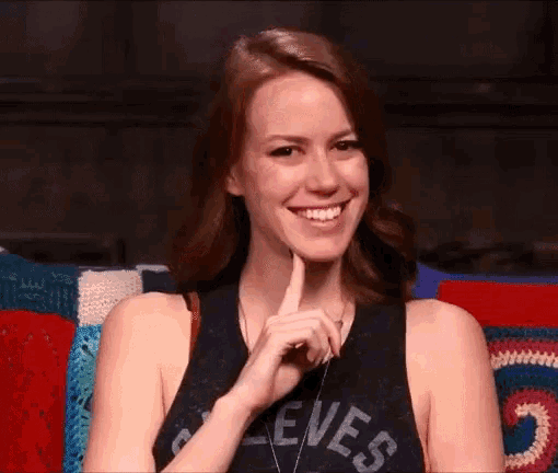 a woman wearing a shirt that says " sleeves " on it