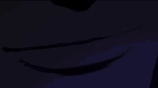 a close up of a person 's mouth with a purple background
