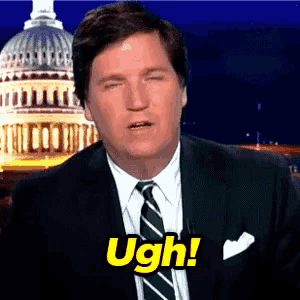a man in a suit and tie is saying the word ugh