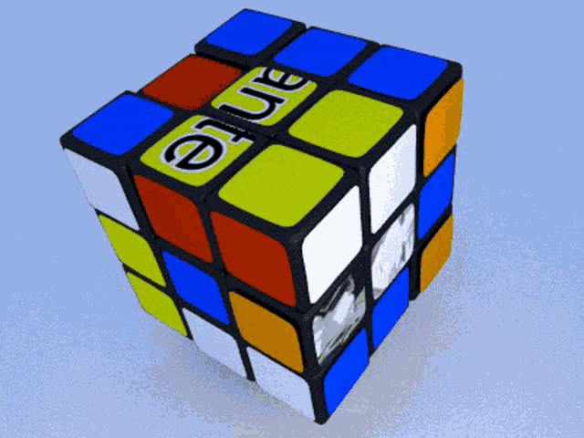 a colorful rubik 's cube with the word blue written on it