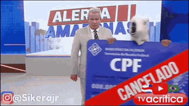 a man in a suit and tie is holding a blue sign that says cpf