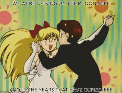 a cartoon of a man kissing a girl on the cheek