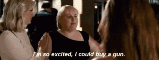two women are talking to each other and one woman is saying i 'm so excited , i could buy a gun