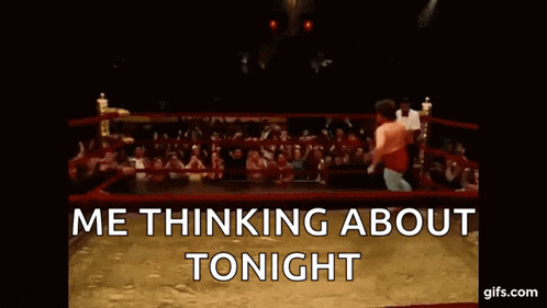 a man in a wrestling ring with the words `` me thinking about tonight '' written on the bottom .