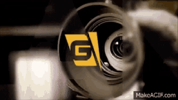 a close up of a camera lens with the letters g and c visible