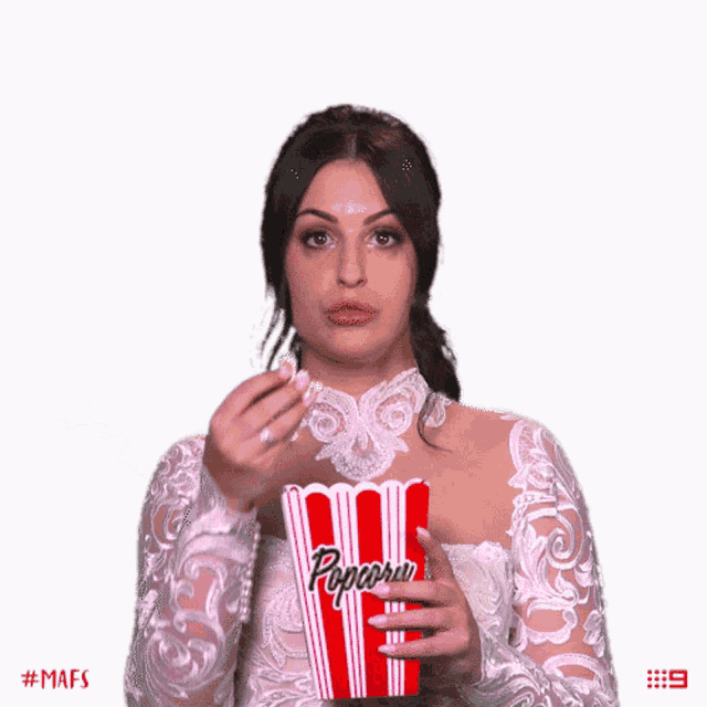 Eating Popcorn Entertained GIF