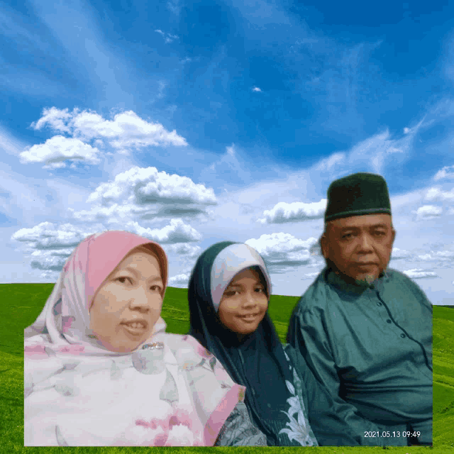 a picture of a man a woman and a child was taken on may 13, 2021