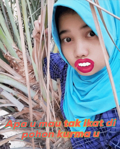 a woman wearing a blue hijab has red lips and the words apa u mau takikat di pohon kurma u on the bottom