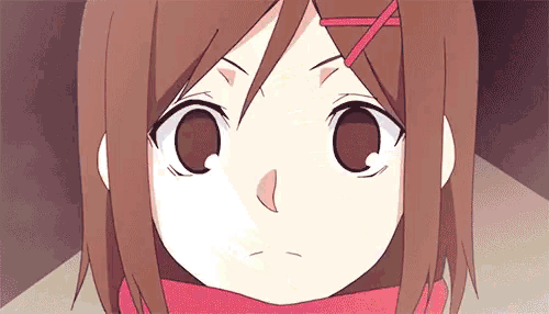 a close up of a cartoon girl with a scarf around her neck .