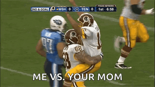a football game between the titans and the redskins is being played