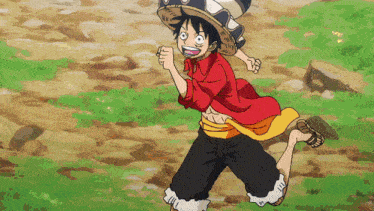 a man in a red shirt and black shorts is running in a field