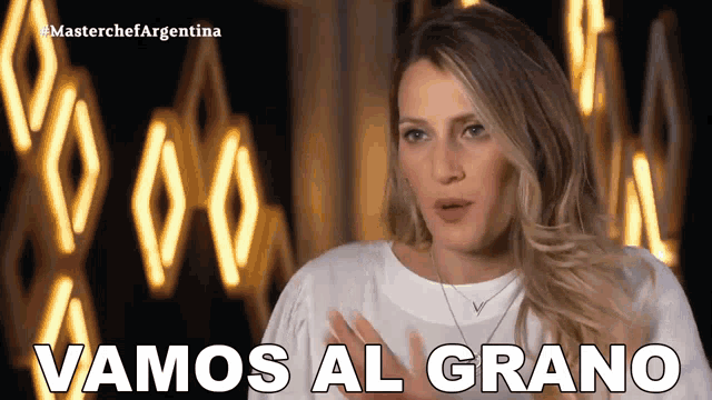 a woman says vamos al grano in spanish