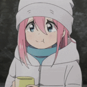 a girl with pink hair and a white hat is holding a cup .
